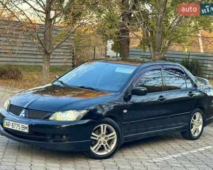 Міцубісі Lancer 2006 у Дніпро (Дніпропетровську) на Automoto.ua Чорний Міцубісі Lancer, об'ємом двигуна 2 л та пробігом 230 тис. км за 4900 $, фото 2 на Automoto.ua