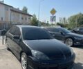Черный Мицубиси Лансер, объемом двигателя 2 л и пробегом 264 тыс. км за 4444 $, фото 1 на Automoto.ua