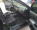 Чорний Міцубісі Lancer, об'ємом двигуна 1.58 л та пробігом 290 тис. км за 3200 $, фото 13 на Automoto.ua