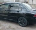 Чорний Міцубісі Lancer, об'ємом двигуна 1.59 л та пробігом 185 тис. км за 4900 $, фото 5 на Automoto.ua