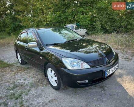Мицубиси Лансер 2006 в Киеве на Automoto.ua Черный Мицубиси Лансер, объемом двигателя 1.58 л и пробегом 268 тыс. км за 3400 $, фото 13 на Automoto.ua