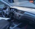 Черный Мицубиси Лансер, объемом двигателя 1.58 л и пробегом 215 тыс. км за 5400 $, фото 16 на Automoto.ua