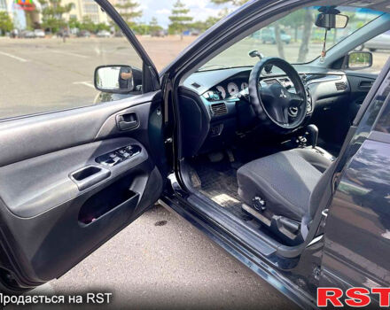 Мицубиси Лансер 2006 в Николаеве на Automoto.ua Черный Мицубиси Лансер, объемом двигателя 1.6 л и пробегом 260 тыс. км за 4999 $, фото 4 на Automoto.ua