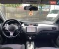 Черный Мицубиси Лансер, объемом двигателя 2 л и пробегом 248 тыс. км за 5790 $, фото 12 на Automoto.ua