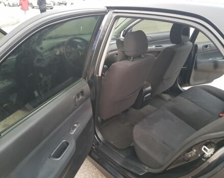 Черный Мицубиси Лансер, объемом двигателя 1.6 л и пробегом 290 тыс. км за 3200 $, фото 8 на Automoto.ua