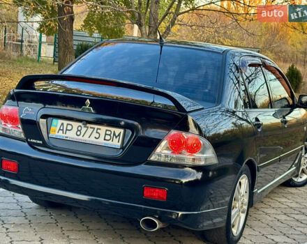 Міцубісі Lancer 2006 у Дніпро (Дніпропетровську) на Automoto.ua Чорний Міцубісі Lancer, об'ємом двигуна 2 л та пробігом 230 тис. км за 4900 $, фото 10 на Automoto.ua