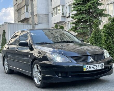 Чорний Міцубісі Lancer, об'ємом двигуна 2 л та пробігом 160 тис. км за 5000 $, фото 1 на Automoto.ua