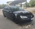 Чорний Міцубісі Lancer, об'ємом двигуна 1.6 л та пробігом 187 тис. км за 3042 $, фото 1 на Automoto.ua