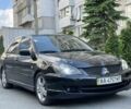 Чорний Міцубісі Lancer, об'ємом двигуна 2 л та пробігом 160 тис. км за 5000 $, фото 1 на Automoto.ua