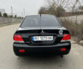 Чорний Міцубісі Lancer, об'ємом двигуна 1.58 л та пробігом 230 тис. км за 3350 $, фото 3 на Automoto.ua