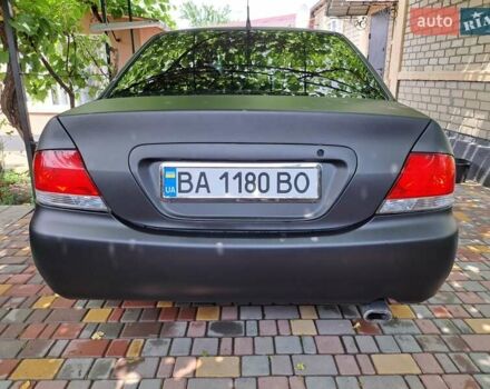 Чорний Міцубісі Lancer, об'ємом двигуна 1.58 л та пробігом 280 тис. км за 3950 $, фото 6 на Automoto.ua