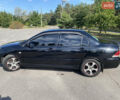 Чорний Міцубісі Lancer, об'ємом двигуна 1.58 л та пробігом 236 тис. км за 4500 $, фото 4 на Automoto.ua