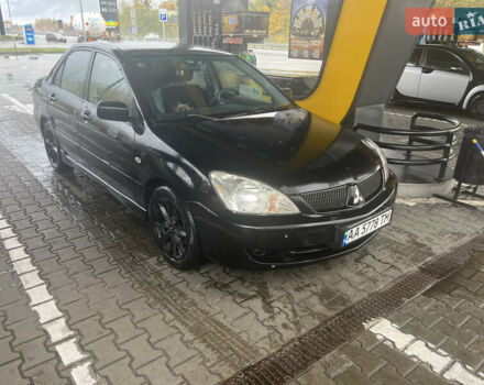 Чорний Міцубісі Lancer, об'ємом двигуна 1.58 л та пробігом 257 тис. км за 2400 $, фото 8 на Automoto.ua