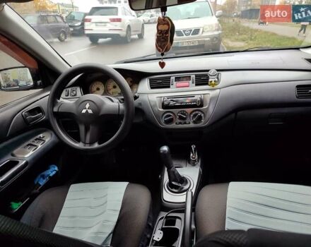 Черный Мицубиси Лансер, объемом двигателя 1.58 л и пробегом 270 тыс. км за 4000 $, фото 10 на Automoto.ua