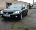 Чорний Міцубісі Lancer, об'ємом двигуна 1.6 л та пробігом 230 тис. км за 3250 $, фото 1 на Automoto.ua