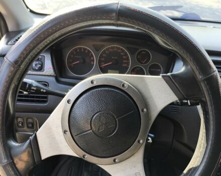 Чорний Міцубісі Lancer, об'ємом двигуна 2 л та пробігом 240 тис. км за 5600 $, фото 5 на Automoto.ua