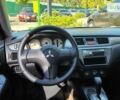 Чорний Міцубісі Lancer, об'ємом двигуна 1.58 л та пробігом 230 тис. км за 4900 $, фото 2 на Automoto.ua