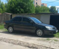 Чорний Міцубісі Lancer, об'ємом двигуна 1.58 л та пробігом 277 тис. км за 3900 $, фото 2 на Automoto.ua