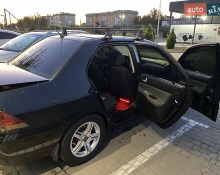 Черный Мицубиси Лансер, объемом двигателя 1.6 л и пробегом 257 тыс. км за 4500 $, фото 9 на Automoto.ua