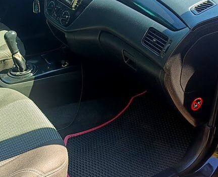 Черный Мицубиси Лансер, объемом двигателя 1.6 л и пробегом 238 тыс. км за 4300 $, фото 7 на Automoto.ua