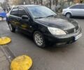 Черный Мицубиси Лансер, объемом двигателя 1.6 л и пробегом 299 тыс. км за 3480 $, фото 1 на Automoto.ua