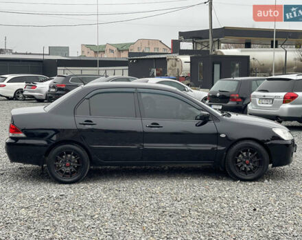 Чорний Міцубісі Lancer, об'ємом двигуна 1.58 л та пробігом 230 тис. км за 3350 $, фото 6 на Automoto.ua