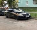 Черный Мицубиси Лансер, объемом двигателя 1.6 л и пробегом 260 тыс. км за 3800 $, фото 1 на Automoto.ua