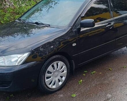 Чорний Міцубісі Lancer, об'ємом двигуна 1.6 л та пробігом 250 тис. км за 4000 $, фото 2 на Automoto.ua