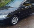 Чорний Міцубісі Lancer, об'ємом двигуна 1.6 л та пробігом 250 тис. км за 4000 $, фото 2 на Automoto.ua