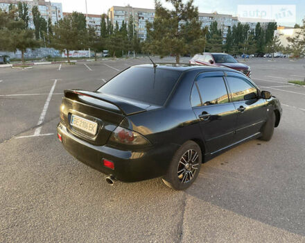 Чорний Міцубісі Lancer, об'ємом двигуна 2 л та пробігом 250 тис. км за 4999 $, фото 2 на Automoto.ua