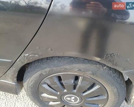 Чорний Міцубісі Lancer, об'ємом двигуна 1.58 л та пробігом 290 тис. км за 3200 $, фото 25 на Automoto.ua