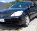 Чорний Міцубісі Lancer, об'ємом двигуна 1.6 л та пробігом 200 тис. км за 4500 $, фото 2 на Automoto.ua