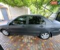 Чорний Міцубісі Lancer, об'ємом двигуна 1.58 л та пробігом 280 тис. км за 3950 $, фото 10 на Automoto.ua