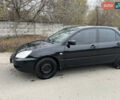 Чорний Міцубісі Lancer, об'ємом двигуна 1.58 л та пробігом 230 тис. км за 3350 $, фото 2 на Automoto.ua
