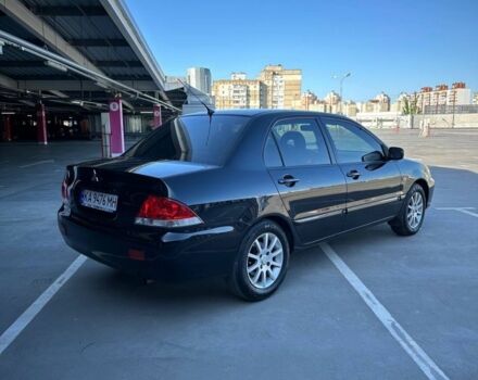 Чорний Міцубісі Lancer, об'ємом двигуна 0.16 л та пробігом 220 тис. км за 4300 $, фото 3 на Automoto.ua