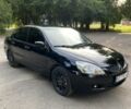 Черный Мицубиси Лансер, объемом двигателя 1.6 л и пробегом 250 тыс. км за 4500 $, фото 1 на Automoto.ua