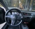 Черный Мицубиси Лансер, объемом двигателя 1.58 л и пробегом 230 тыс. км за 3800 $, фото 14 на Automoto.ua