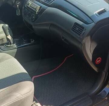 Чорний Міцубісі Lancer, об'ємом двигуна 1.6 л та пробігом 240 тис. км за 3900 $, фото 10 на Automoto.ua