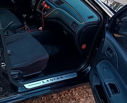 Чорний Міцубісі Lancer, об'ємом двигуна 1.6 л та пробігом 345 тис. км за 3700 $, фото 3 на Automoto.ua