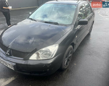 Чорний Міцубісі Lancer, об'ємом двигуна 1.58 л та пробігом 257 тис. км за 2400 $, фото 2 на Automoto.ua