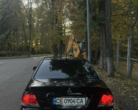 Черный Мицубиси Лансер, объемом двигателя 1.6 л и пробегом 233 тыс. км за 3650 $, фото 3 на Automoto.ua