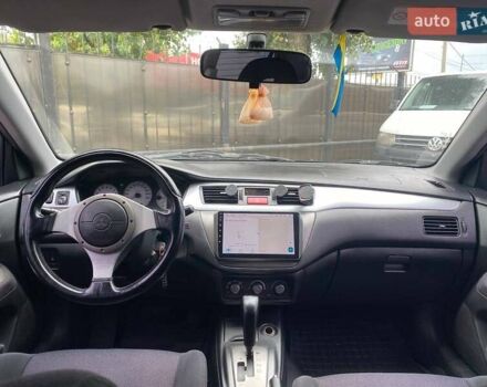 Чорний Міцубісі Lancer, об'ємом двигуна 2 л та пробігом 248 тис. км за 4990 $, фото 12 на Automoto.ua
