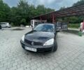 Черный Мицубиси Лансер, объемом двигателя 1.58 л и пробегом 213 тыс. км за 3300 $, фото 1 на Automoto.ua