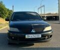 Чорний Міцубісі Lancer, об'ємом двигуна 2 л та пробігом 288 тис. км за 4000 $, фото 1 на Automoto.ua