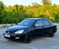 Чорний Міцубісі Lancer, об'ємом двигуна 1.6 л та пробігом 220 тис. км за 3200 $, фото 1 на Automoto.ua