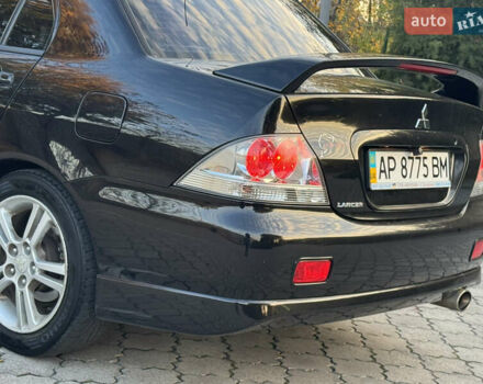 Міцубісі Lancer 2006 у Дніпро (Дніпропетровську) на Automoto.ua Чорний Міцубісі Lancer, об'ємом двигуна 2 л та пробігом 230 тис. км за 4900 $, фото 13 на Automoto.ua