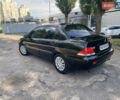 Чорний Міцубісі Lancer, об'ємом двигуна 1.58 л та пробігом 180 тис. км за 5200 $, фото 3 на Automoto.ua