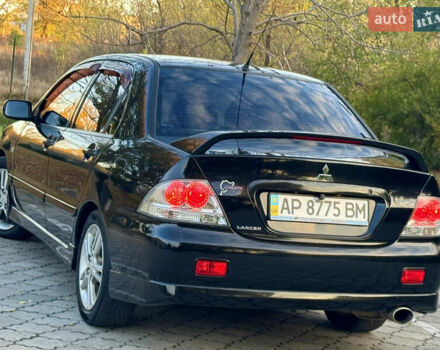 Міцубісі Lancer 2006 у Дніпро (Дніпропетровську) на Automoto.ua Чорний Міцубісі Lancer, об'ємом двигуна 2 л та пробігом 230 тис. км за 4900 $, фото 8 на Automoto.ua