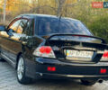 Міцубісі Lancer 2006 у Дніпро (Дніпропетровську) на Automoto.ua Чорний Міцубісі Lancer, об'ємом двигуна 2 л та пробігом 230 тис. км за 4900 $, фото 8 на Automoto.ua