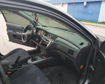 Черный Мицубиси Лансер, объемом двигателя 1.6 л и пробегом 290 тыс. км за 3200 $, фото 6 на Automoto.ua